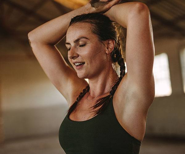 Woman stretching after training
