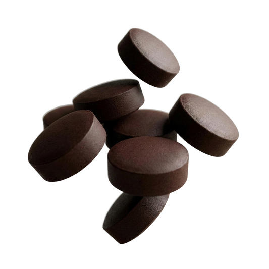 Close-up of Recov protein tablets