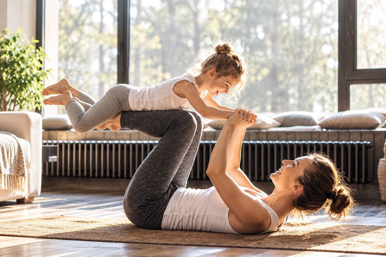 Mum and daughter doing yoga at home